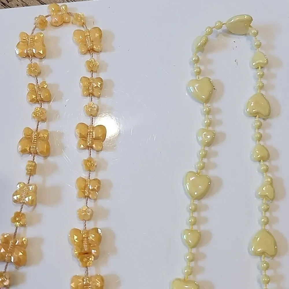 Kids play necklaces orange and yellow